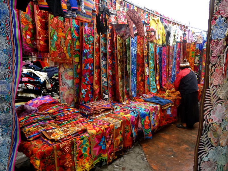 in the photo: a market in the city of Otavalo in Ecuador