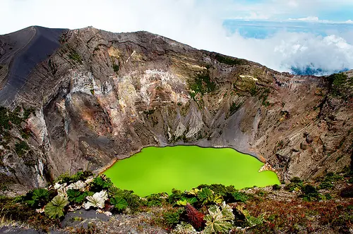 In the photo: the crater lake of the Poas volcano in Costa Rica