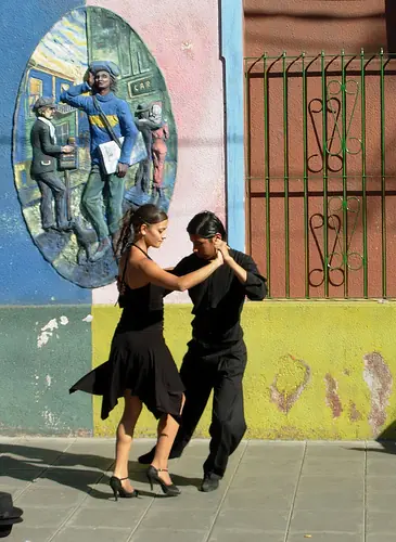 In  photo: a couple dancing an Argentine tango