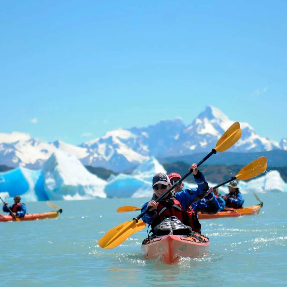 In the photo: kayaking among icebergs in Antarctica 