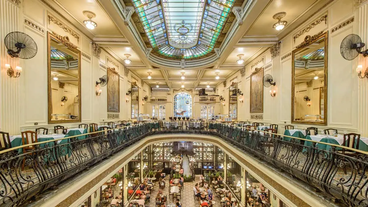 Interior of historic Confeitaria Colombo café in Rio de Janeiro, stained glass and mirrors