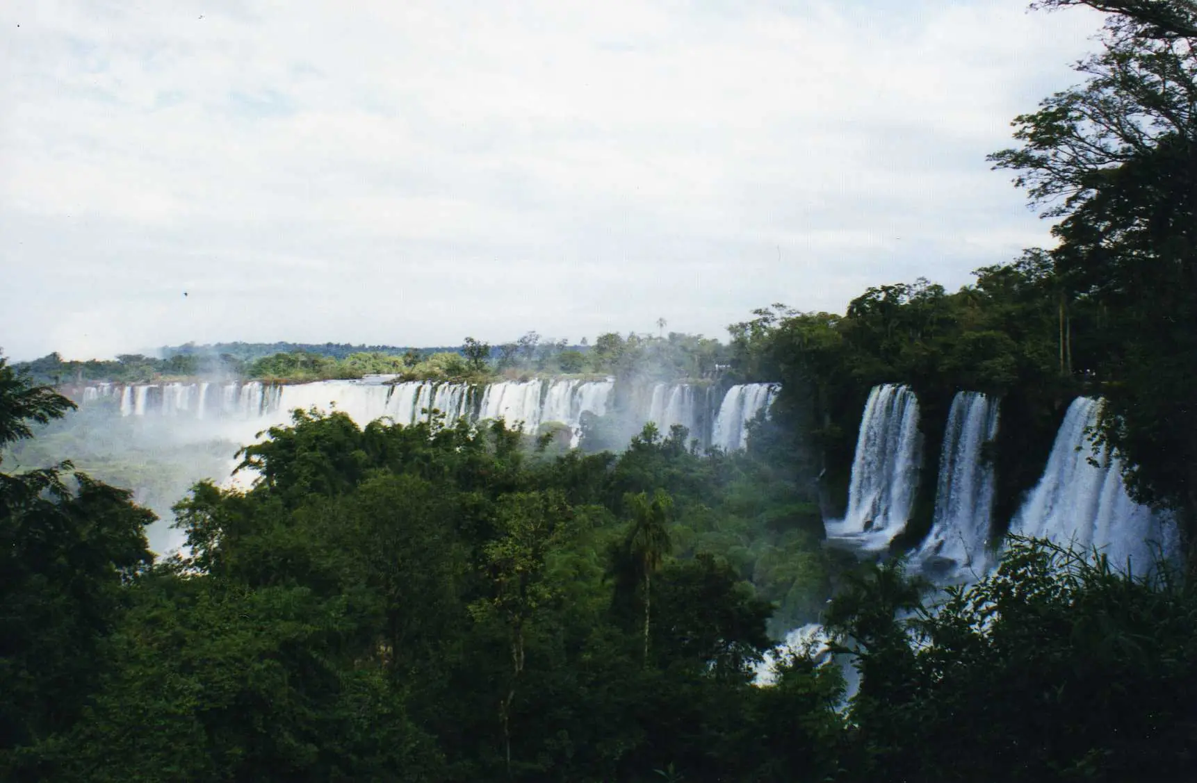 Romantic views of Iguazu Falls, sunset and rainbow