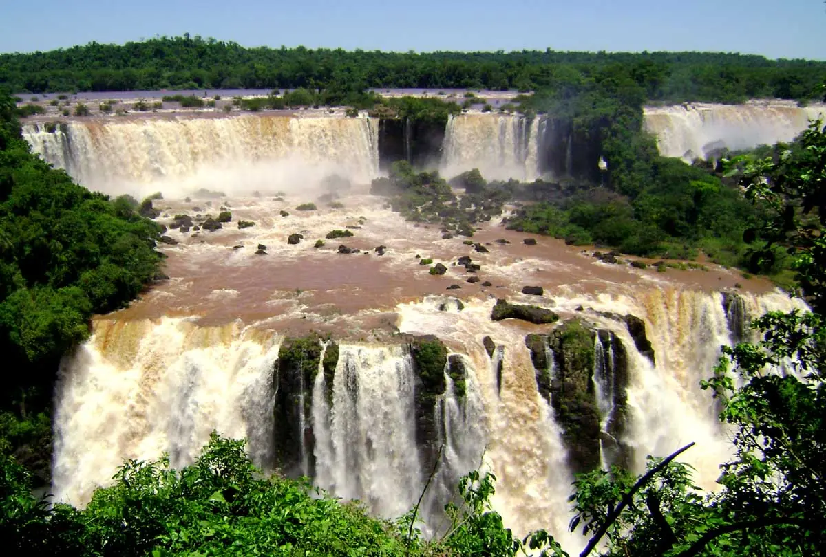 Iguazu Falls cascades in Brazil and Argentina, water power and tropical forest