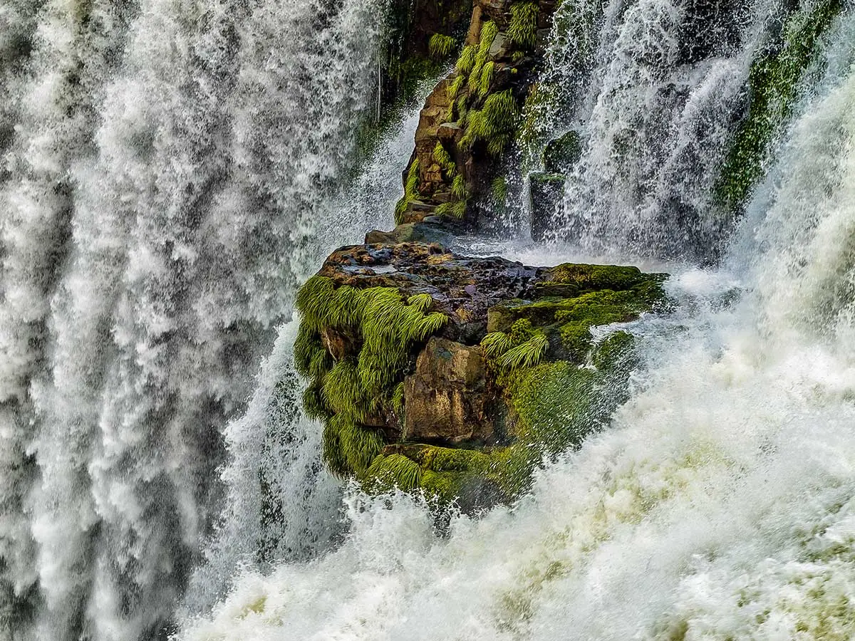 Romantic view of Iguazu Falls, Devil's Throat and spray in the sunlight