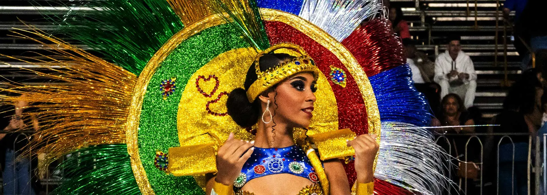 Girl in a bright carnival costume at the Champions Parade in Rio