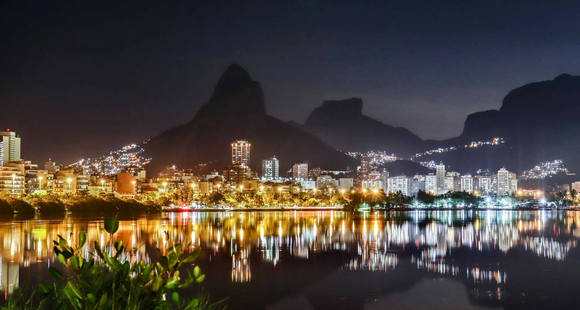 Guanabara Bay at night in Rio, boat lights and Rio-Niterói Bridge in Brazil