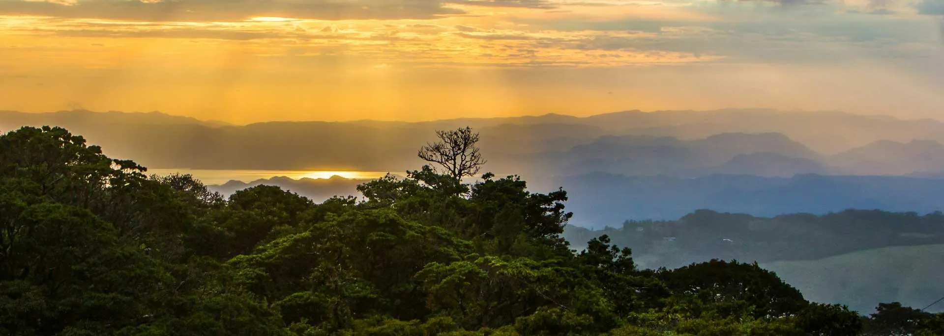 Sunset over Costa Rica beach, golden sand
