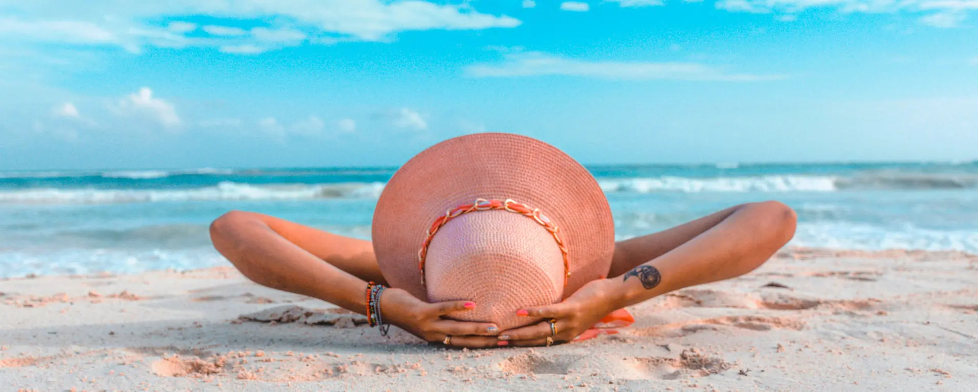 Girl on the white sand of Cancun, Mexico, beach vacation and ocean