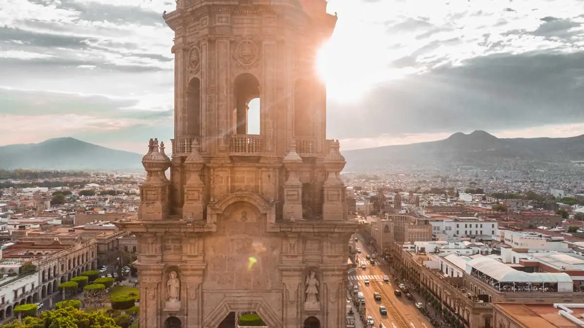 Downtown Mexico City at sunset from above, city panorama and golden sky