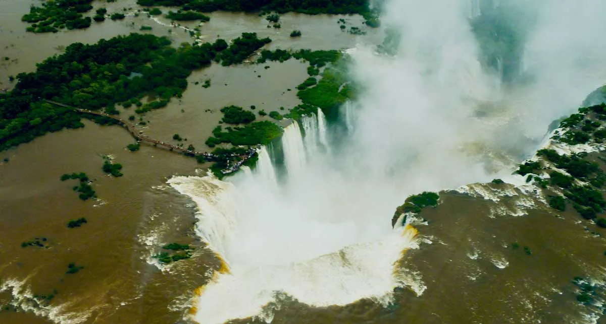 Helicopter tour over Iguazu Falls, bird's-eye panoramic view of the cascades