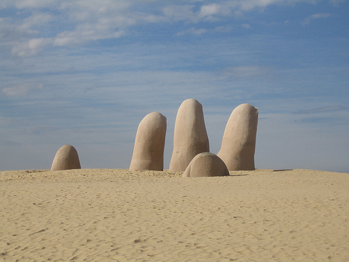 In the photo: the city of Punta del Este, statue of the Hand, Uruguay