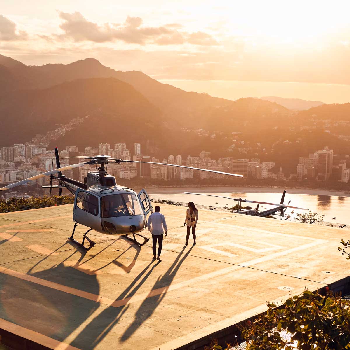 Helicopter flight over Rio de Janeiro, view of Copacabana beach and Sugarloaf Mountain