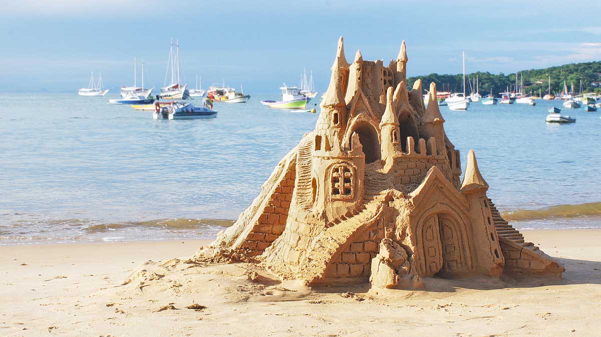 Sandcastle on Buzios beach, Brazil, beach fun and tropical scenery