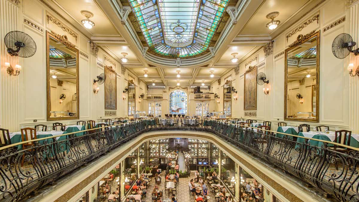 Interior of historic Confeitaria Colombo café in Rio de Janeiro, stained glass and mirrors