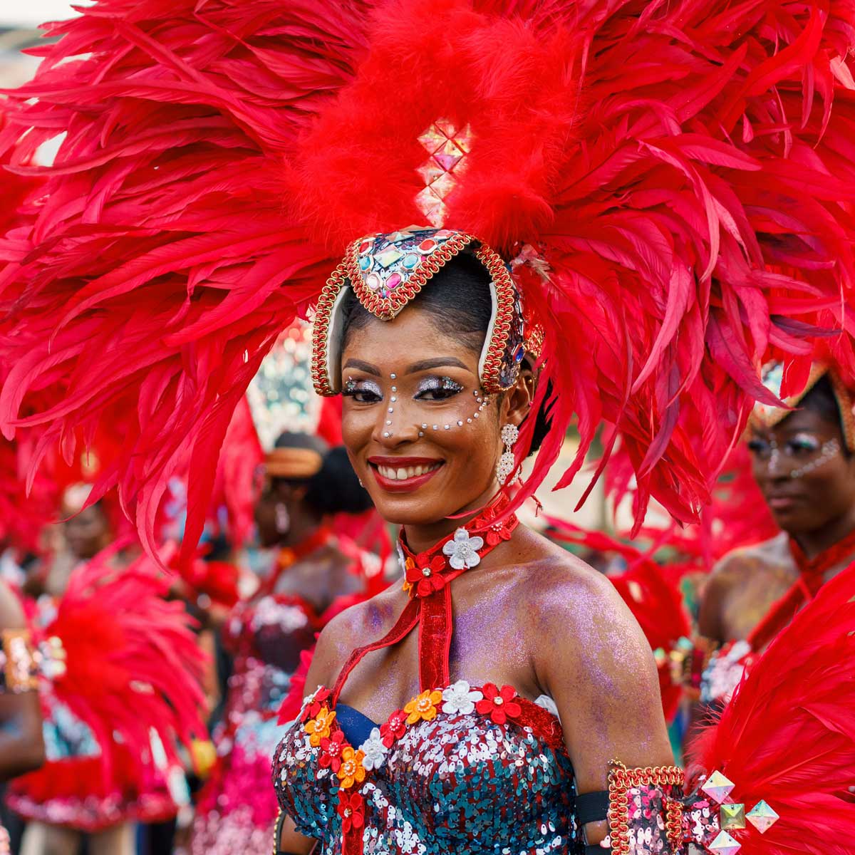 Rio Carnival, Brazilian dancers in bright feathered costumes at the parade