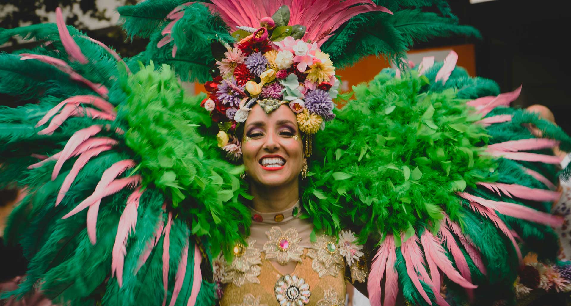 Girl in green feathers at Rio Carnival, sambadrome and Brazilian festival