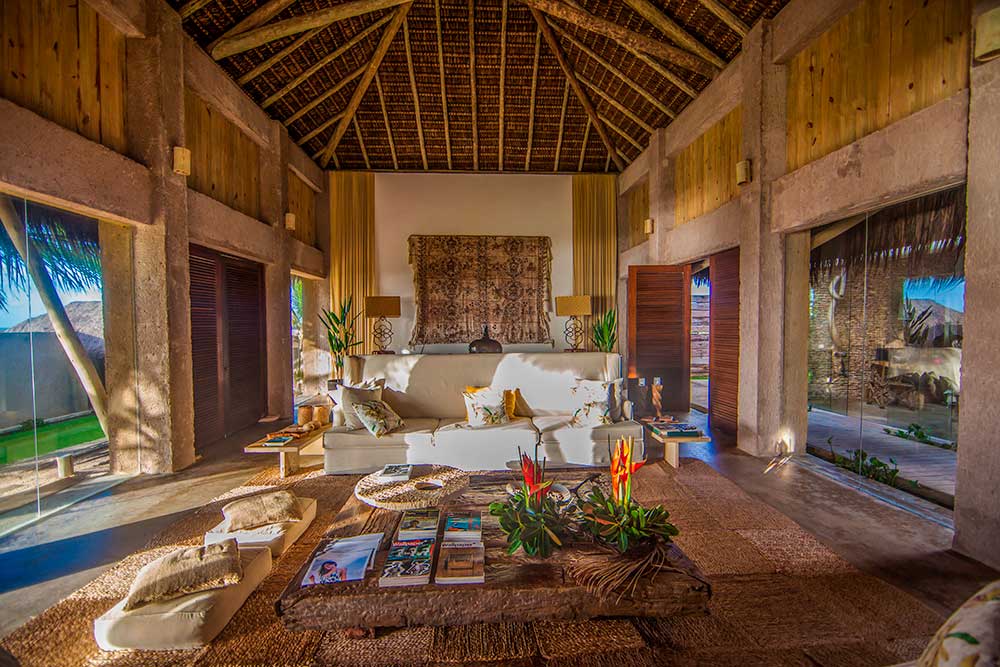 Kenoa room interiors, natural fabrics and stone in harmony with the Atlantic Forest