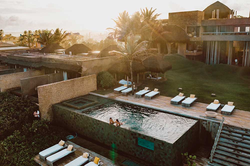 Kenoa's infinity pool, panoramic Atlantic views and the beach below