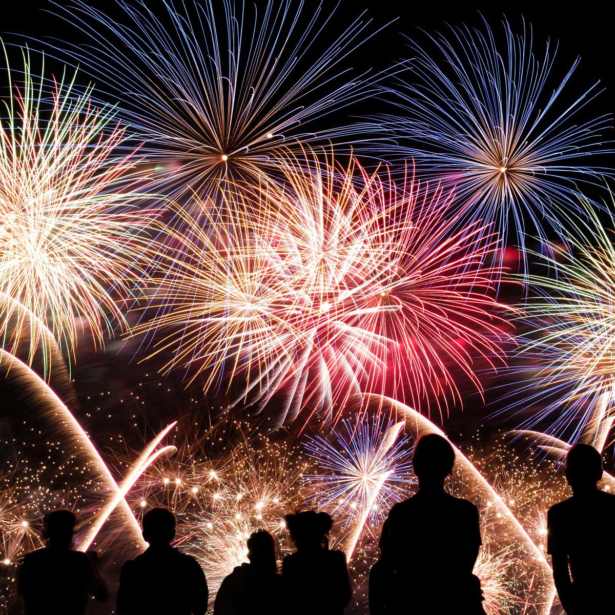 Celebratory fireworks in Rio at Copacabana, New Year's Eve by the ocean in Brazil