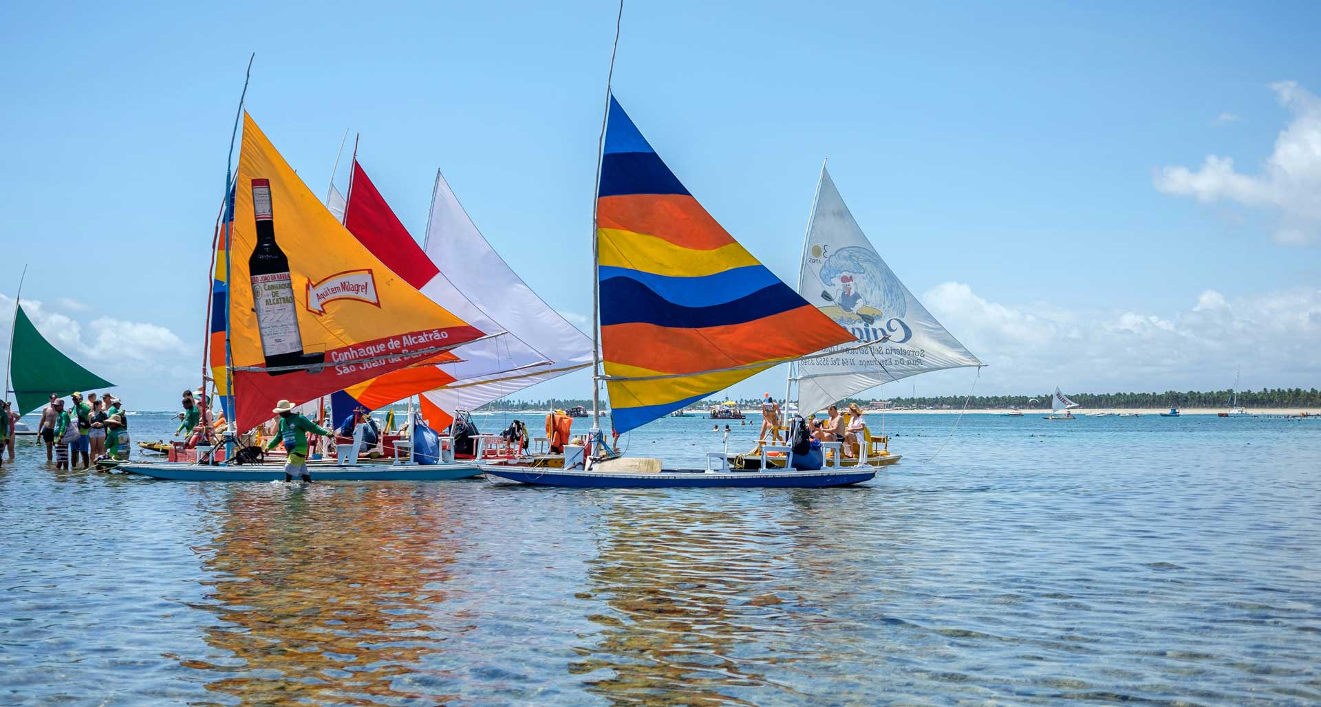 Sailing regatta in Porto de Galinhas, Brazil – colorful sailboats on turquoise water, beach resort activity