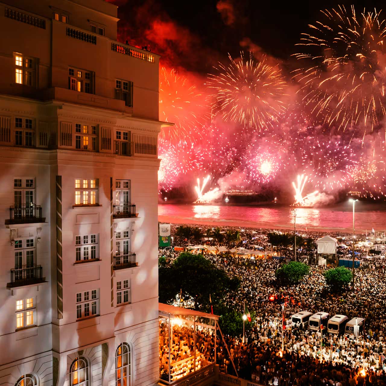 Celebratory fireworks in Rio at Copacabana, New Year's Eve by the ocean in Brazil