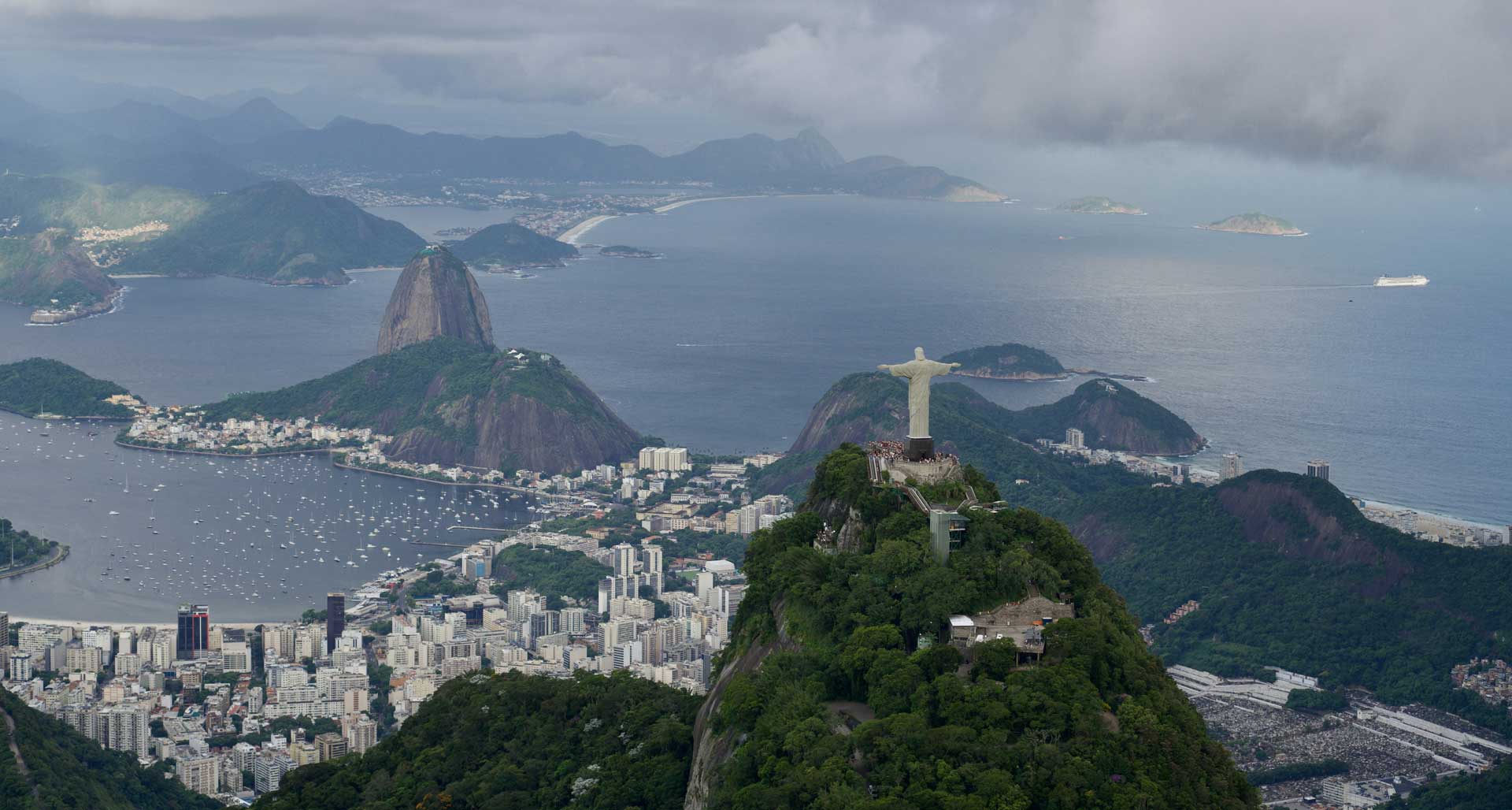 Panorama of Rio and Christ statue from above, mountain and ocean view