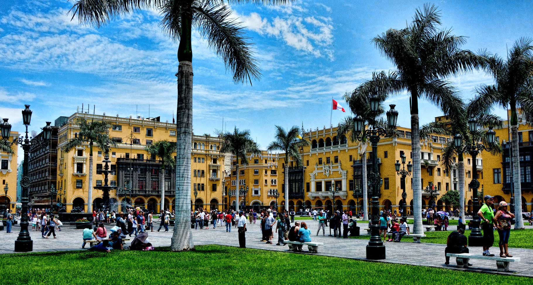 Plaza de Armas main square in Lima with yellow buildings, Peru