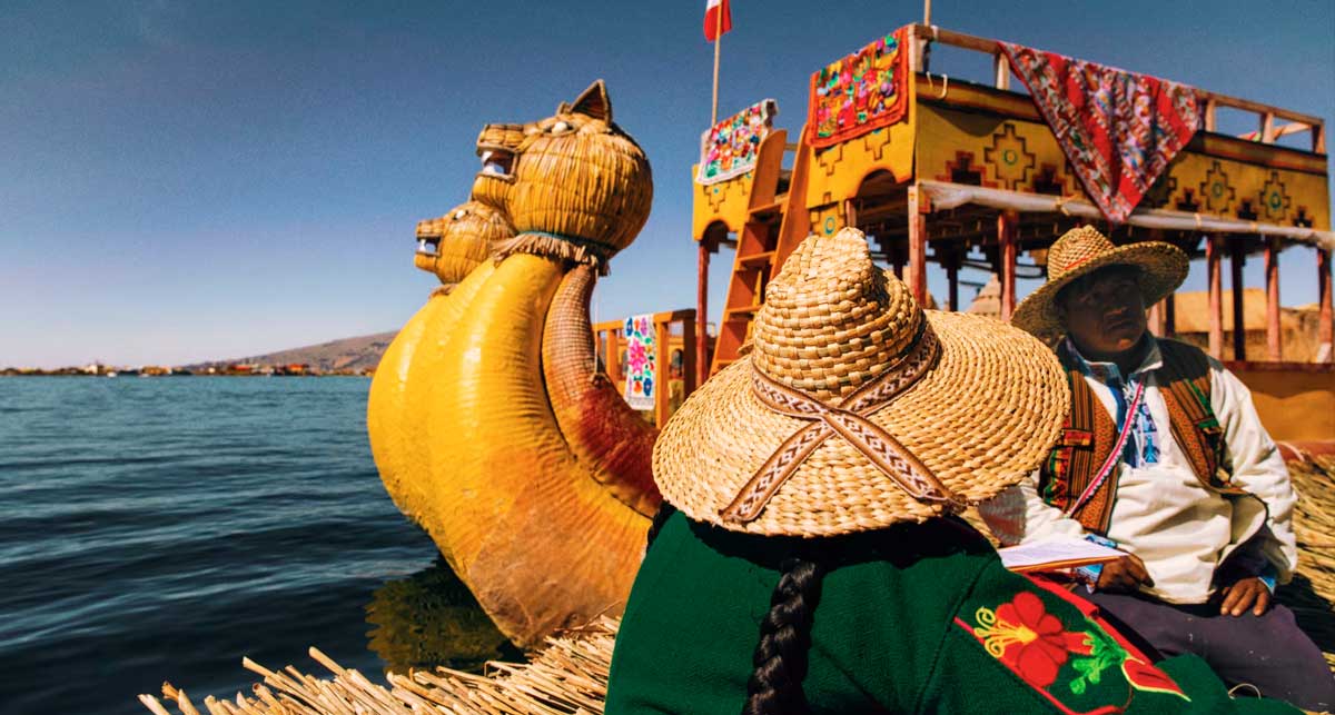 Uros floating islands on Lake Titicaca in Peru, boat tour to the indigenous community