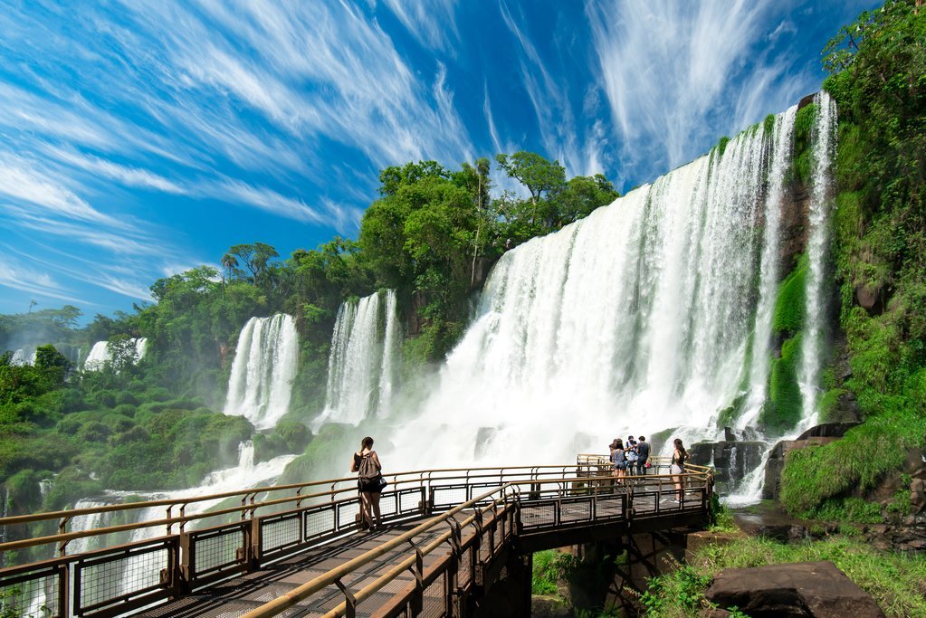 Visitors on a walkway beside Iguazú Falls on the Argentine side.