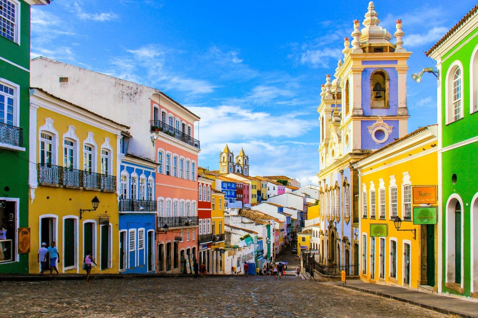 Colourful historic buildings on a street in Salvador, Bahia.