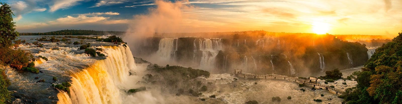 Wide sunset panorama of Iguazu Falls from the Brazilian side