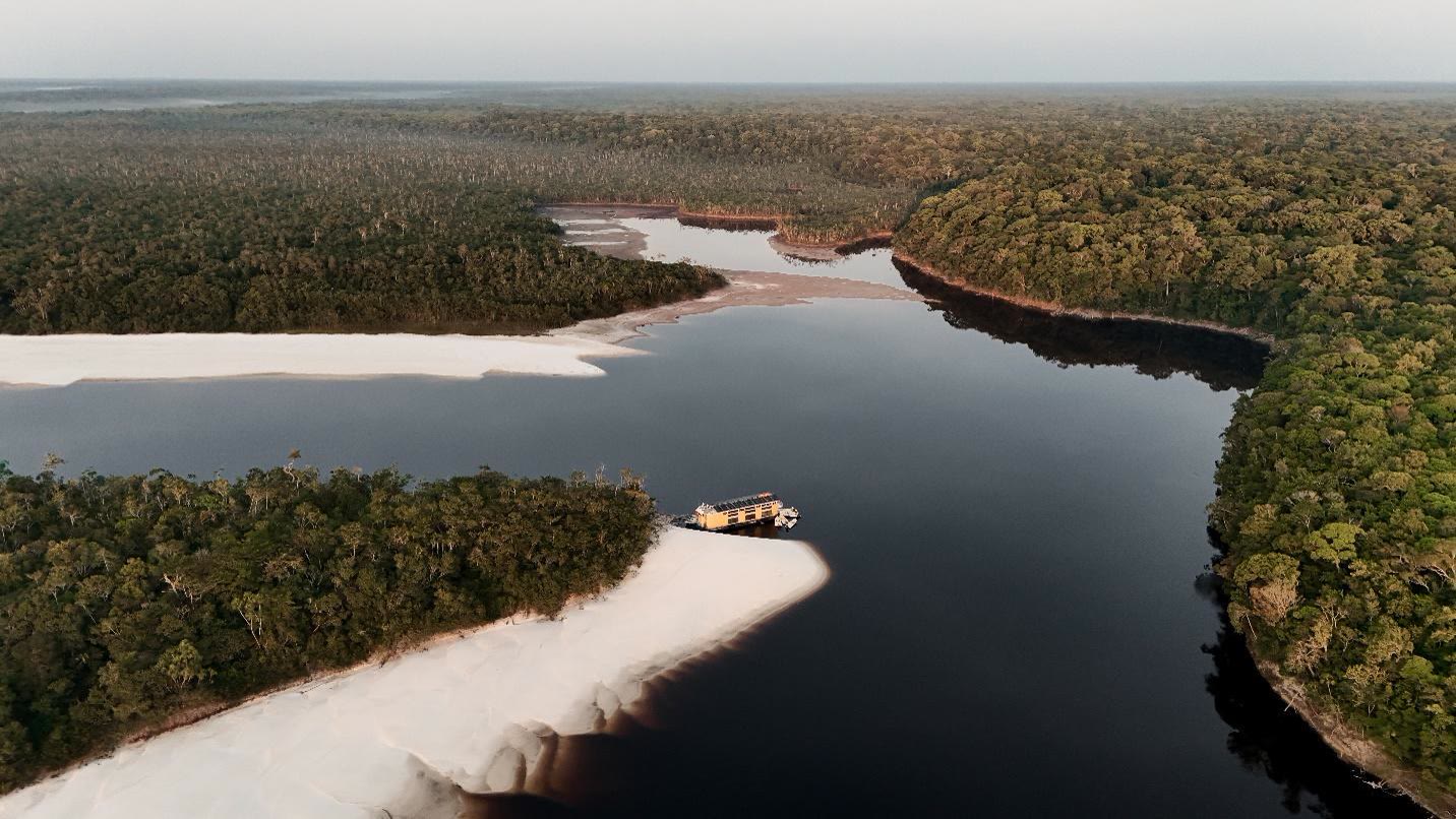 River vessel on an Amazon waterway, illustrating an extension that needs separate supplier confirmation