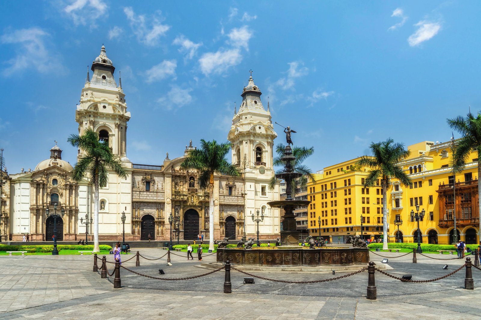 Lima's cathedral and the Plaza Mayor, with colonial buildings and palm trees around the square.