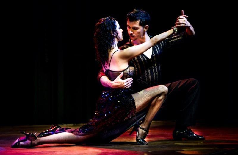 A couple dancing tango on stage in Buenos Aires, Argentina.