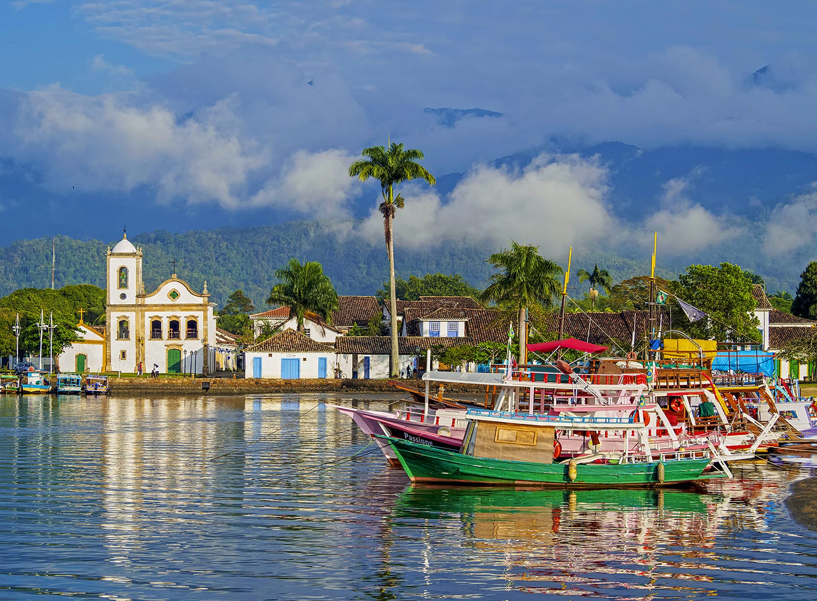 Boats and waterfront buildings in Paraty, Brazil.